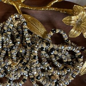 Gold and Black Metallic Beaded Necklace With Evil Eye & Elephant Charm